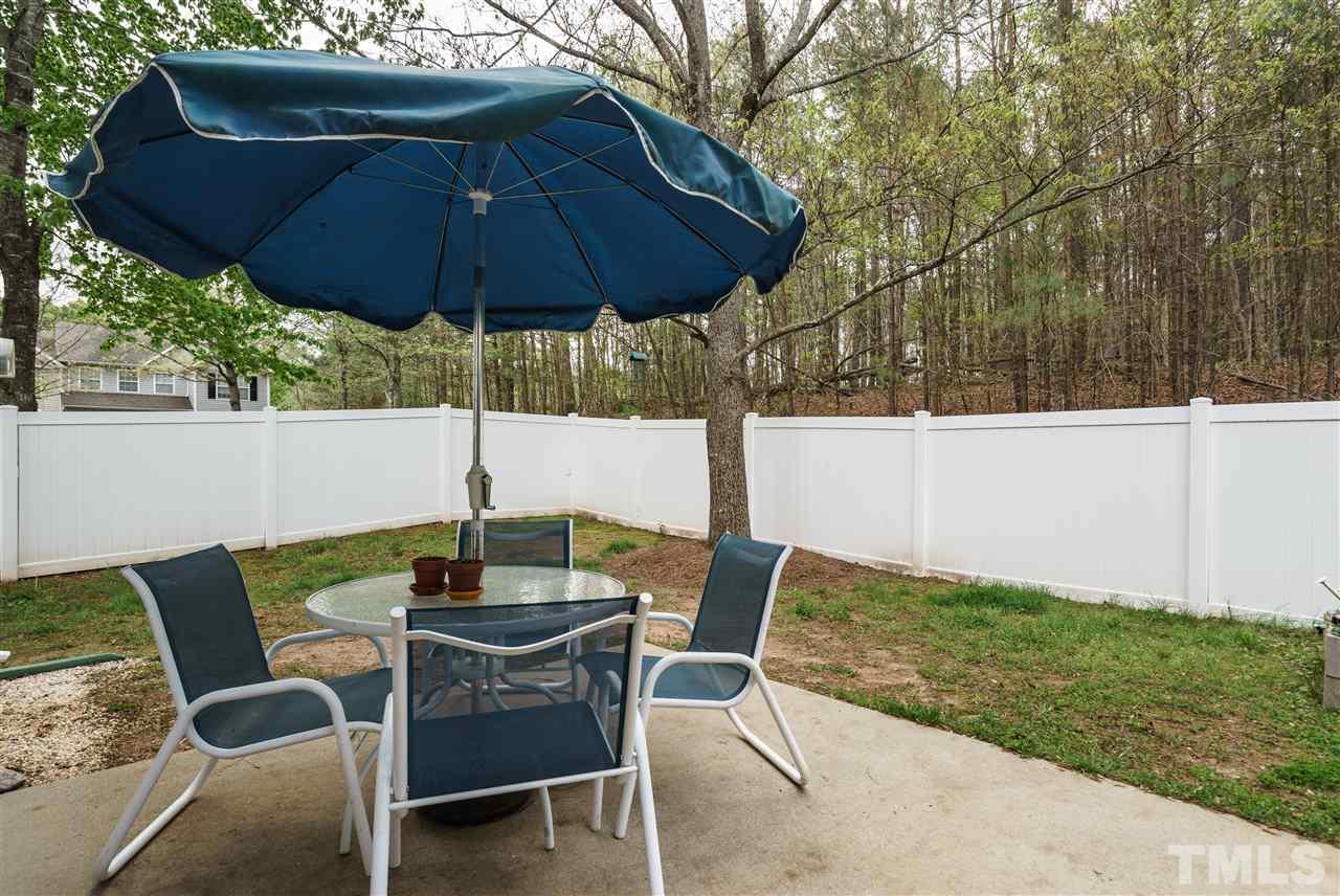 5301 Eolian Court Raleigh, NC 27607 - Photo 24 of 25 Nice pored patio, level yard there is a raised garden for flowers, vegetables and herbs