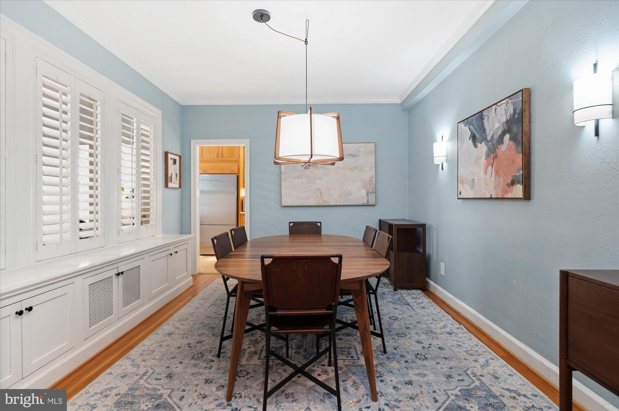 4514 Connecticut Avenue Northwest, Unit 206 Washington, DC 20008 - Photo 7 of 19 a view of a dining room with furniture window and wooden floor