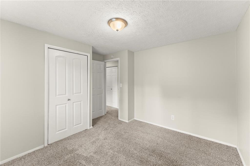 2036 Countydown Lane Stone Mountain, GA 30088 - Photo 13 of 20 a view of an empty room
