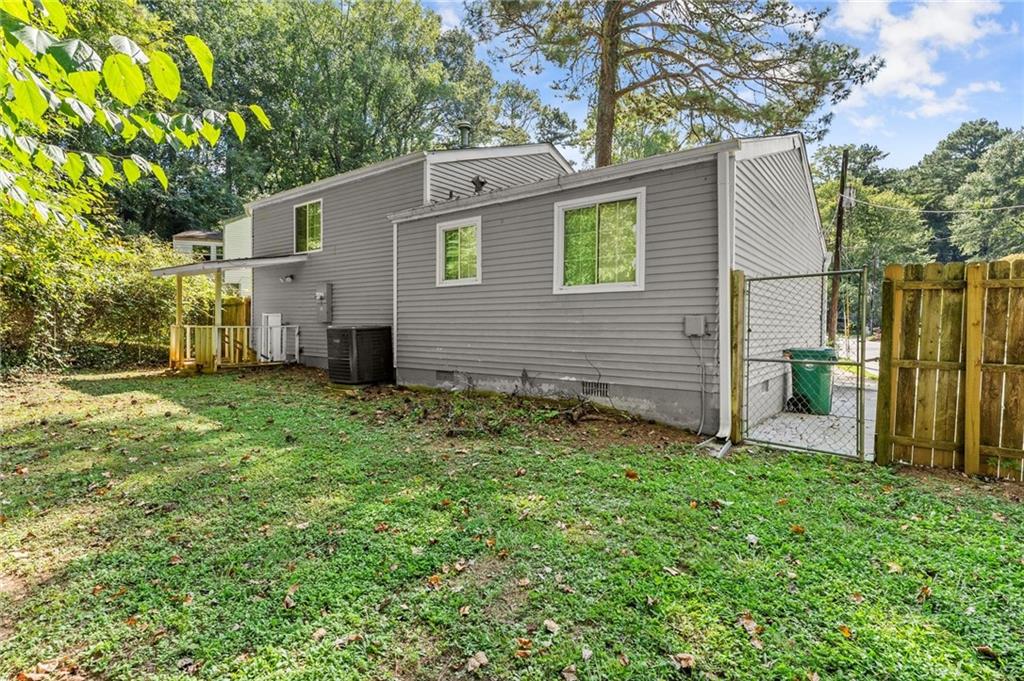 2036 Countydown Lane Stone Mountain, GA 30088 - Photo 19 of 20 a view of a backyard with plants