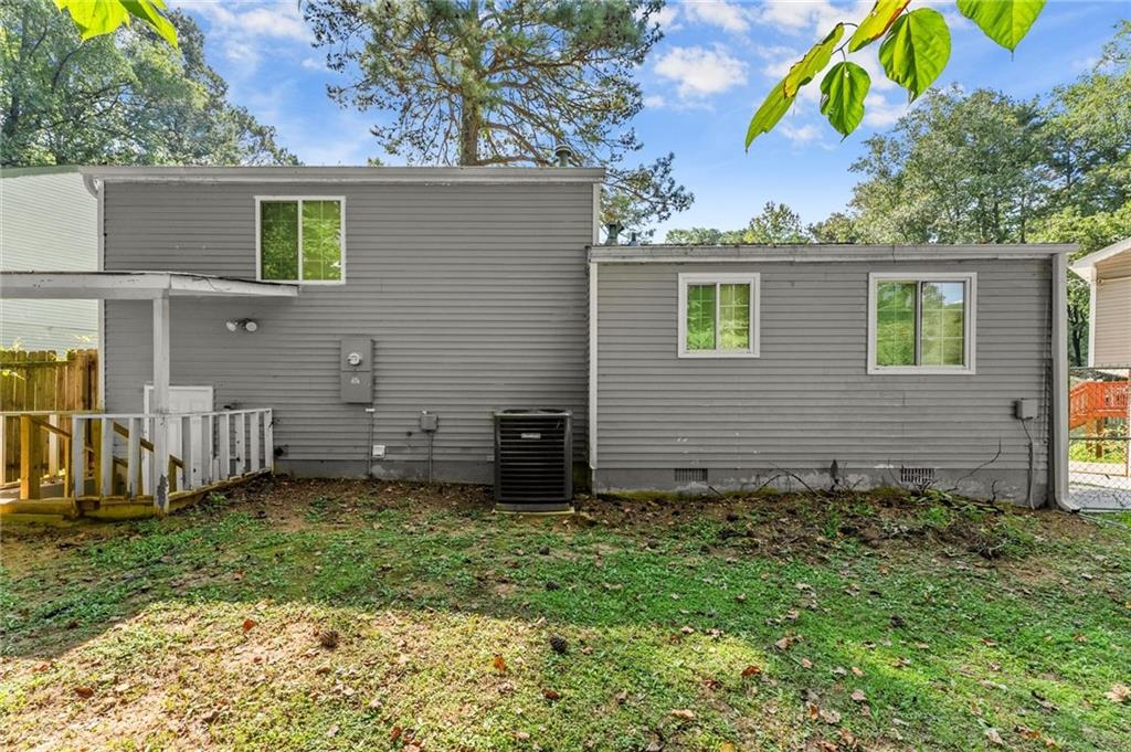 2036 Countydown Lane Stone Mountain, GA 30088 - Photo 20 of 20 a view of a house with a yard