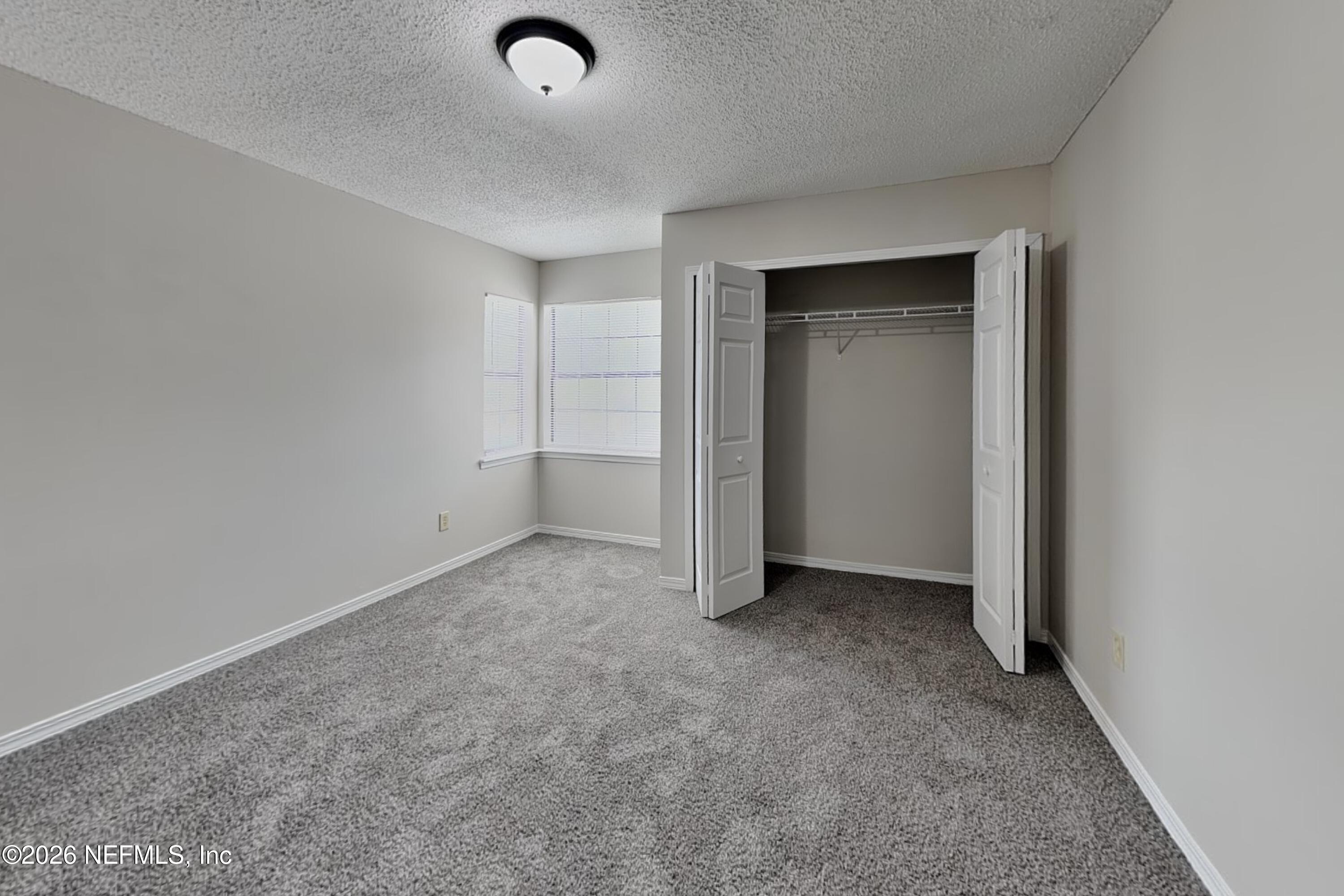 5332 Fort Caroline Road Jacksonville, FL 32277 - Photo 16 of 24 15_Bedroom-01_Image_m1dyiOq5xE