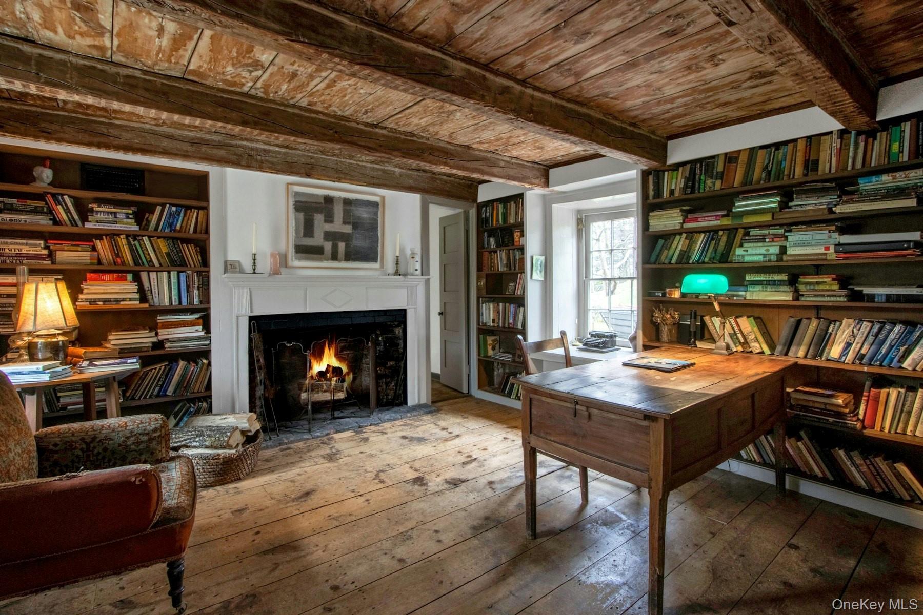 75 Washington Springs Road Palisades, NY 10964 - Photo 15 of 48 a living room with furniture and a fireplace