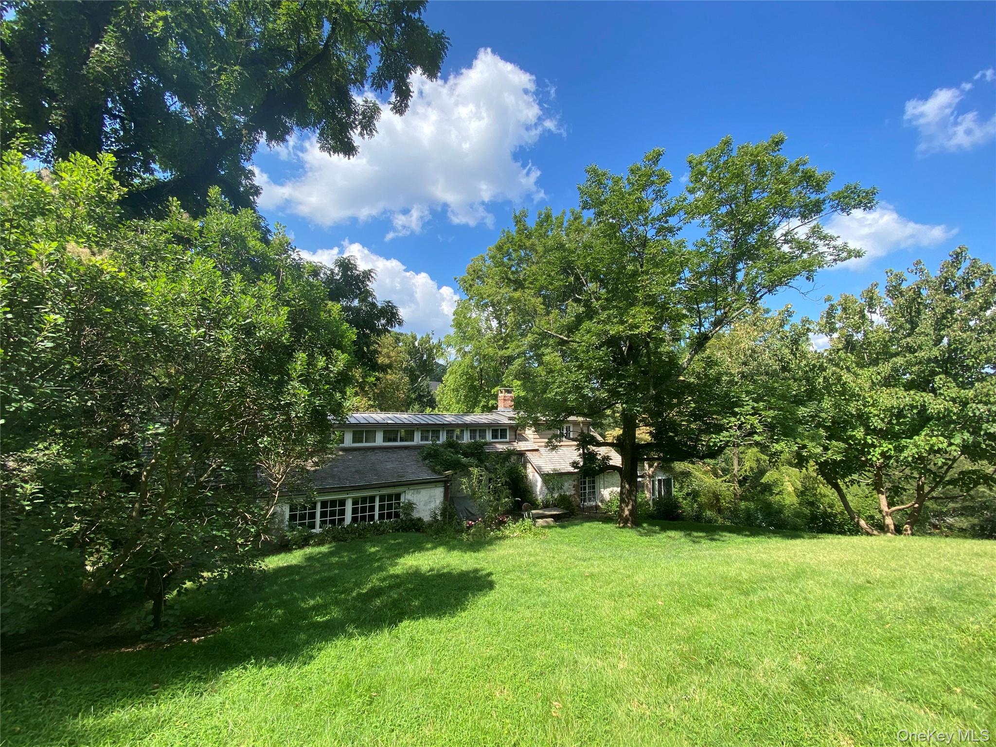 75 Washington Springs Road Palisades, NY 10964 - Photo 45 of 48 a view of a house with a backyard