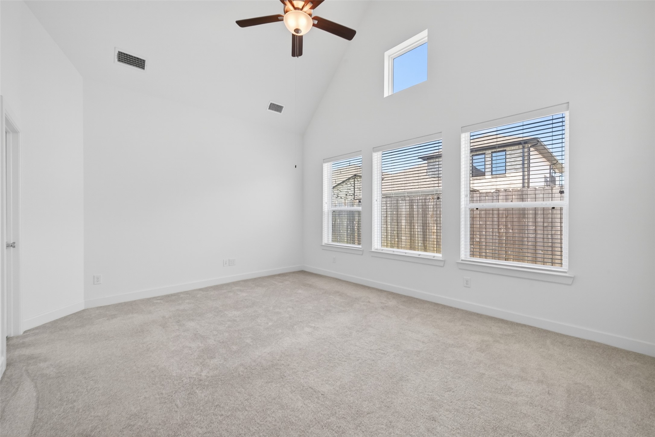 211 Amaranth Way Richmond, TX 77406 - Photo 22 of 26 an empty room with a window