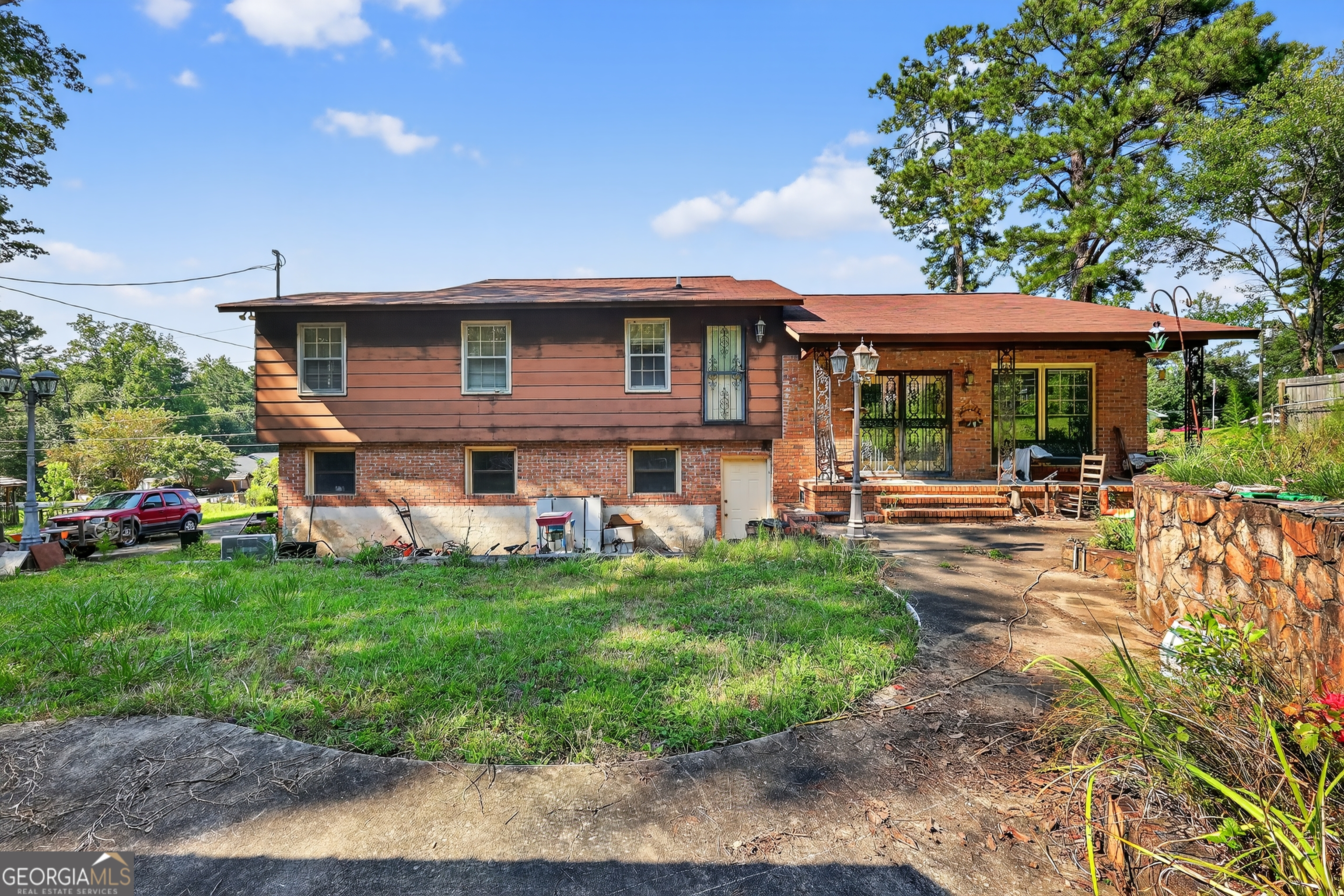 621 Mayes Way Manchester, GA 31816 - Photo 11 of 30 a view of a house with a yard porch and sitting area