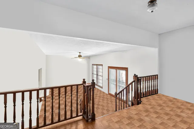a kitchen with stainless steel appliances granite countertop a sink and cabinets