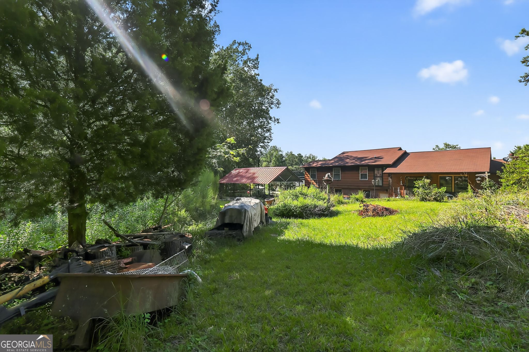 621 Mayes Way Manchester, GA 31816 - Photo 2 of 30 a view of a house with a yard and sitting area