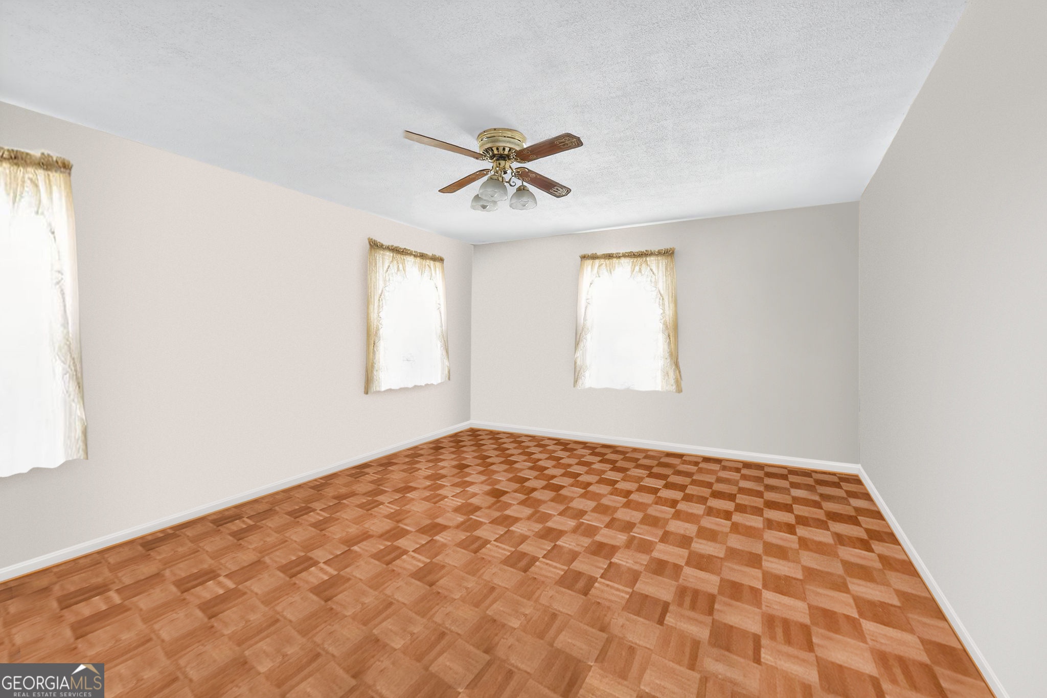 621 Mayes Way Manchester, GA 31816 - Photo 26 of 30 a view of a big room with windows and chandelier fan