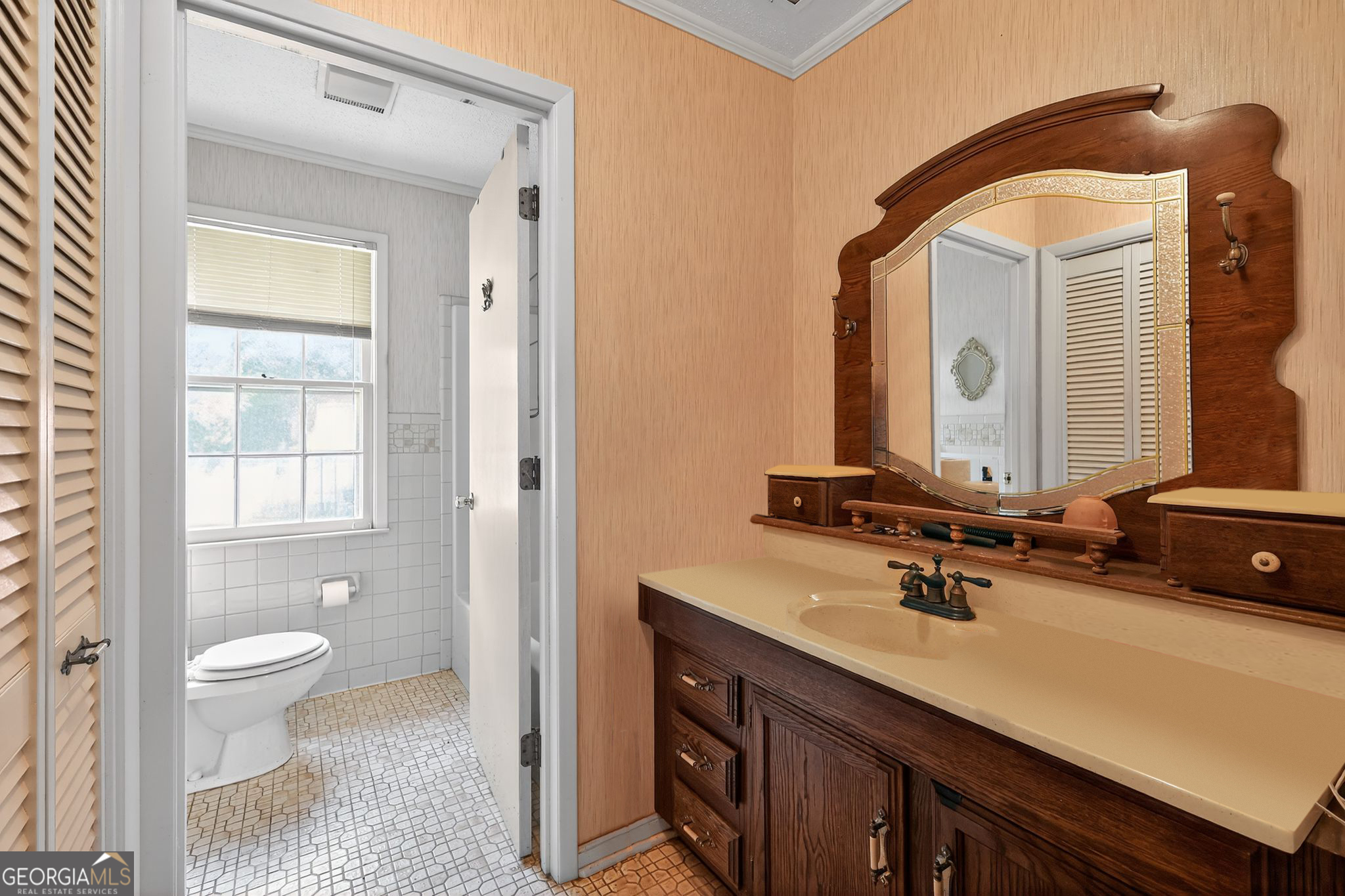 621 Mayes Way Manchester, GA 31816 - Photo 28 of 30 a bathroom with a toilet sink and mirror