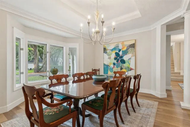 a view of a patio with table and chairs