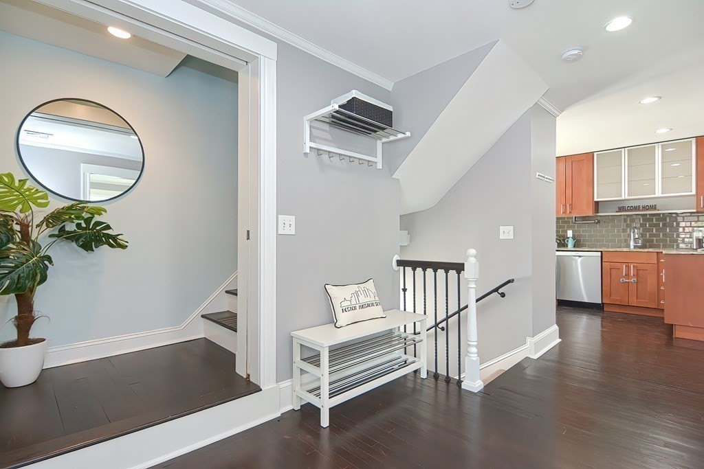 7-9 Goodway Road, Unit 2 Jamaica Plain, MA 02130 - Photo 15 of 39 wooden floor in an empty room with a window
