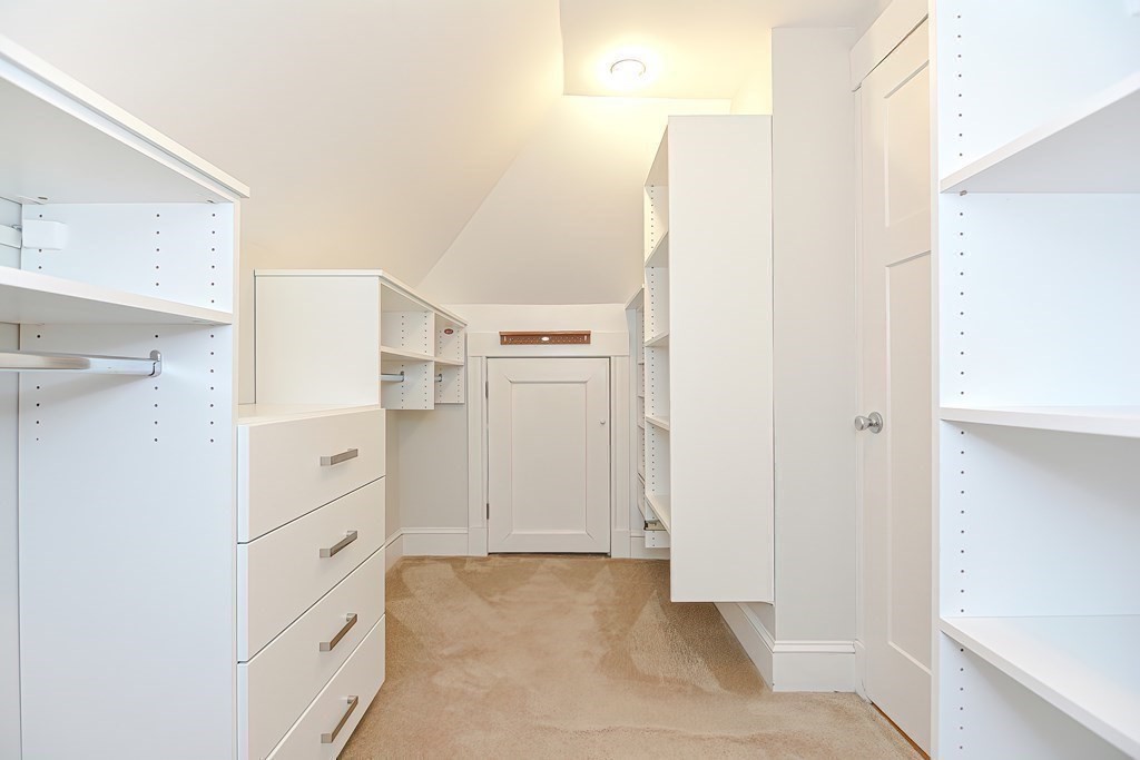 7-9 Goodway Road, Unit 2 Jamaica Plain, MA 02130 - Photo 21 of 39 a view of walk in closet with cabinet