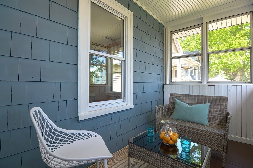 7-9 Goodway Road, Unit 2 Jamaica Plain, MA 02130 - Photo 37 of 39 a outdoor living space with furniture and a window
