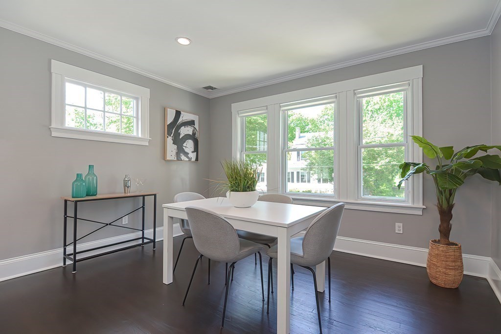 7-9 Goodway Road, Unit 2 Jamaica Plain, MA 02130 - Photo 8 of 39 a view of a dining room with furniture window and wooden floor