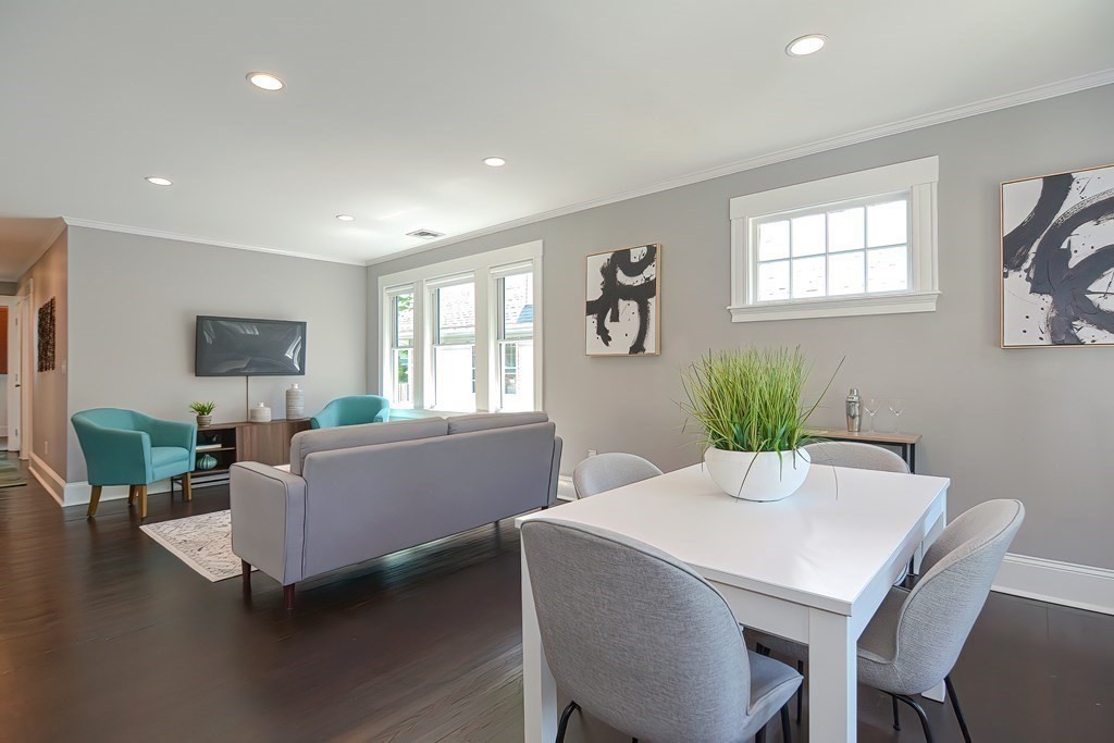 7-9 Goodway Road, Unit 2 Jamaica Plain, MA 02130 - Photo 9 of 39 a living room with furniture potted plant and window