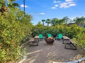a roof deck view with a seating space