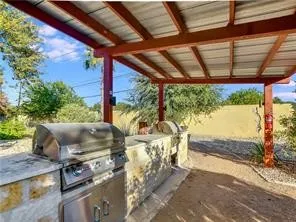 front view of a house with a garden