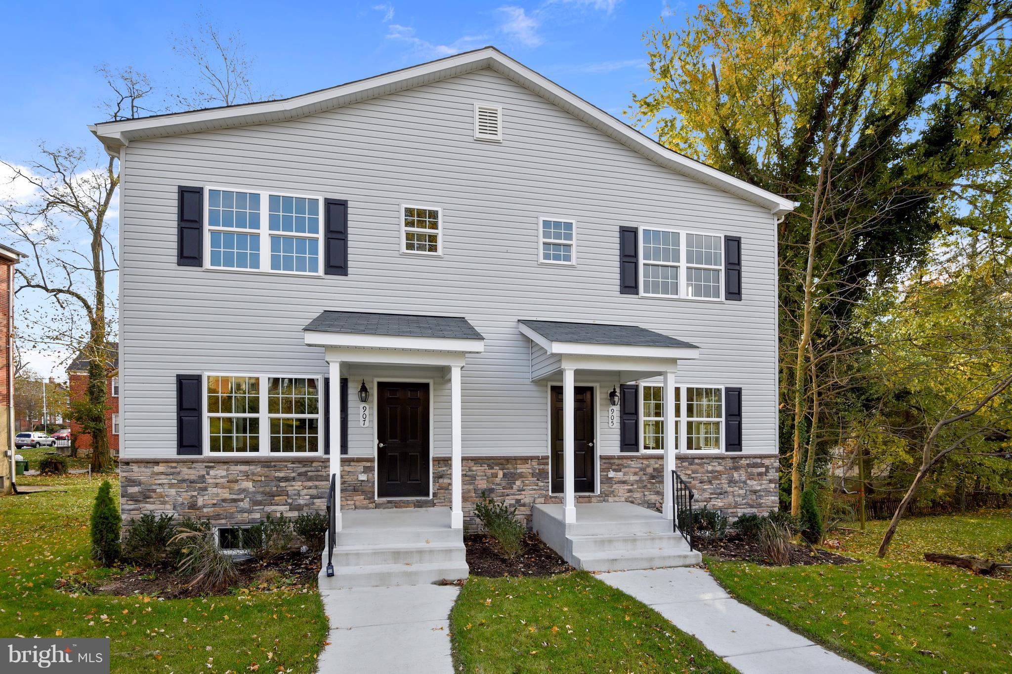 905 Cedarcroft Road Baltimore, MD 21212 - Photo 1 of 28 a front view of a house with porch