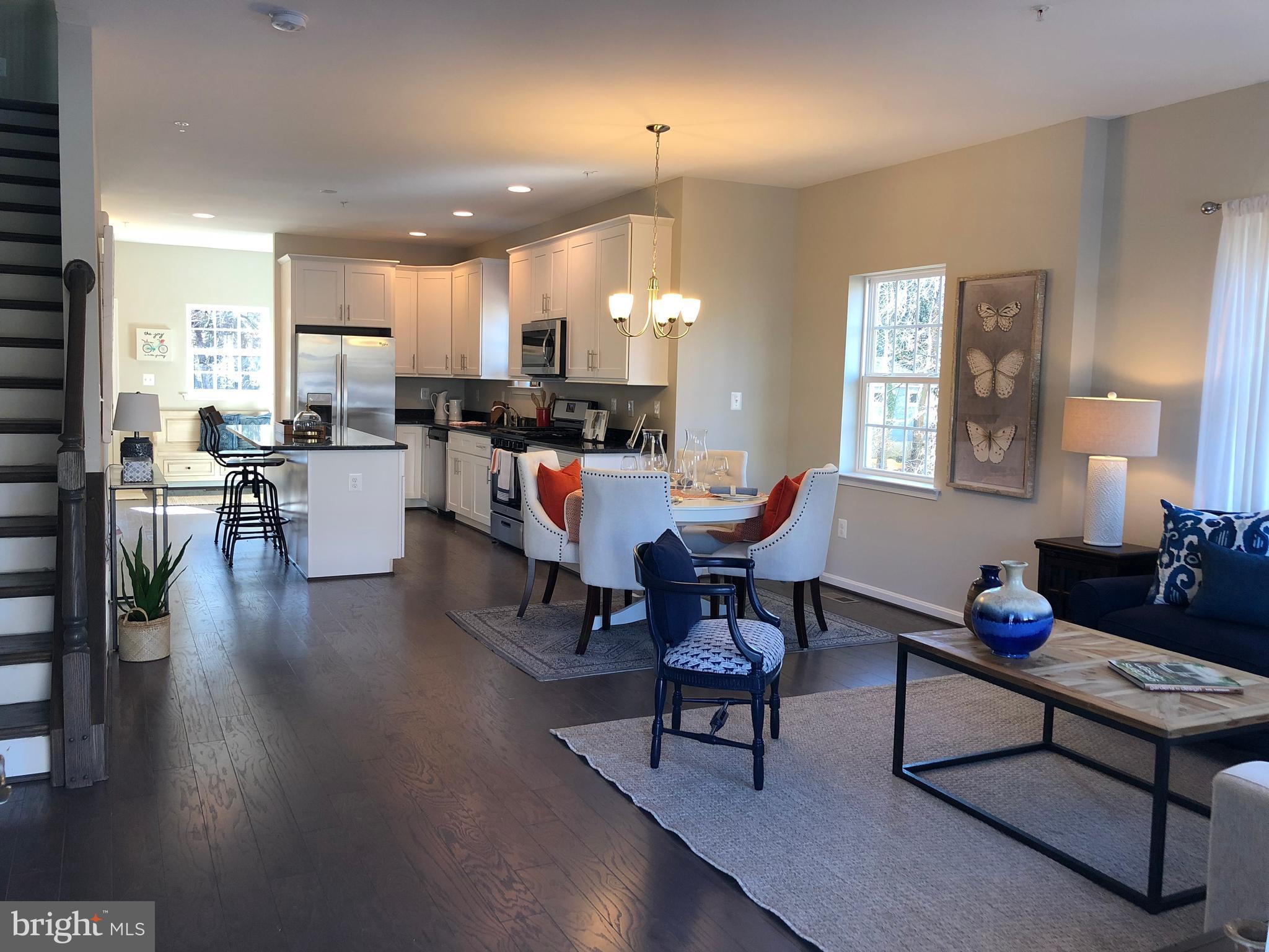 905 Cedarcroft Road Baltimore, MD 21212 - Photo 2 of 28 a living room with furniture and wooden floor