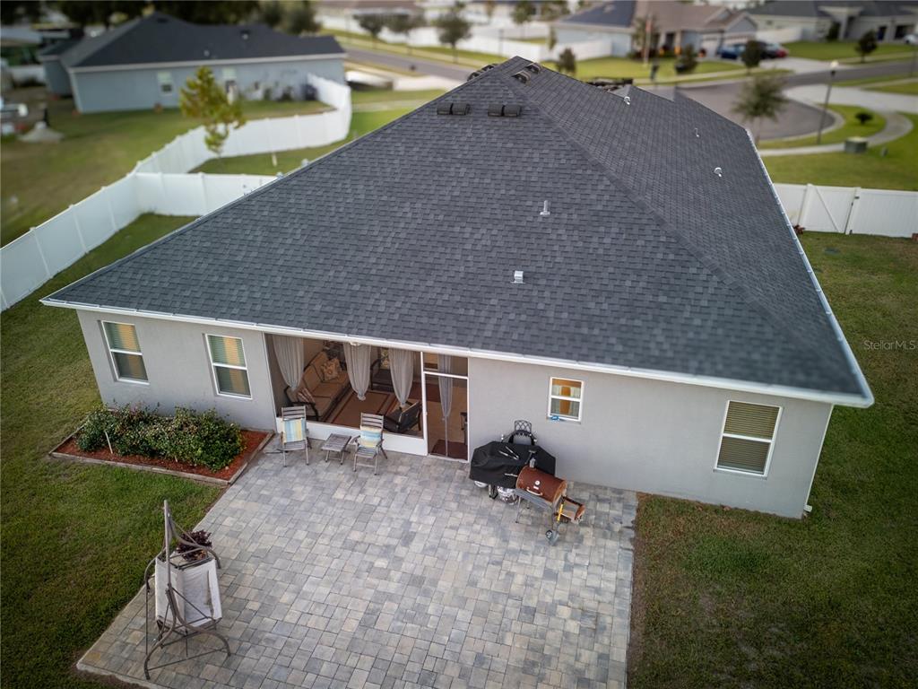 4444 Devinshire Fields Loop Plant City, FL 33567 - Photo 30 of 38 a view of a house with backyard