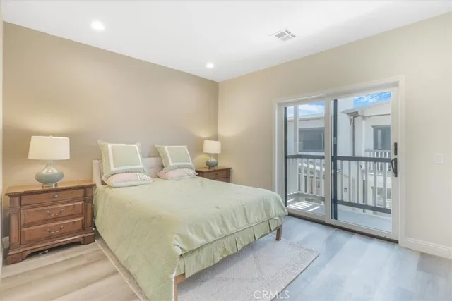 a bathroom with double vanity sink and a mirror