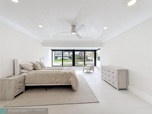 a bathroom with a shower and a sink