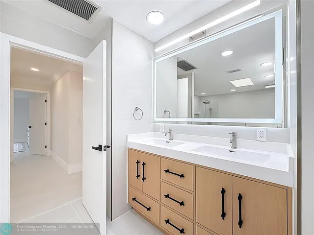 a view of a swimming pool with an outdoor seating