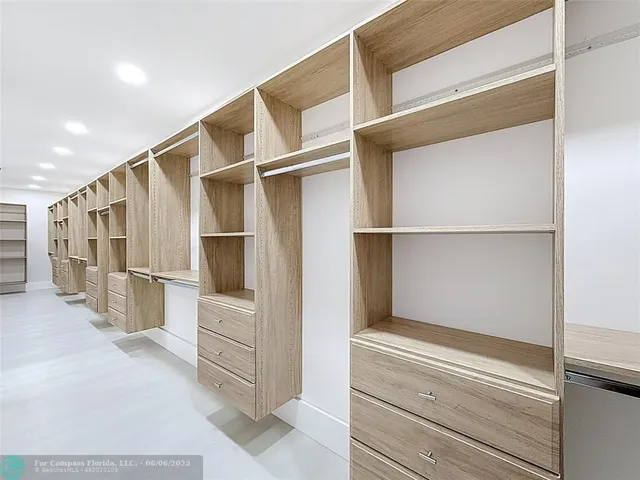 a front view of house with yard and outdoor seating