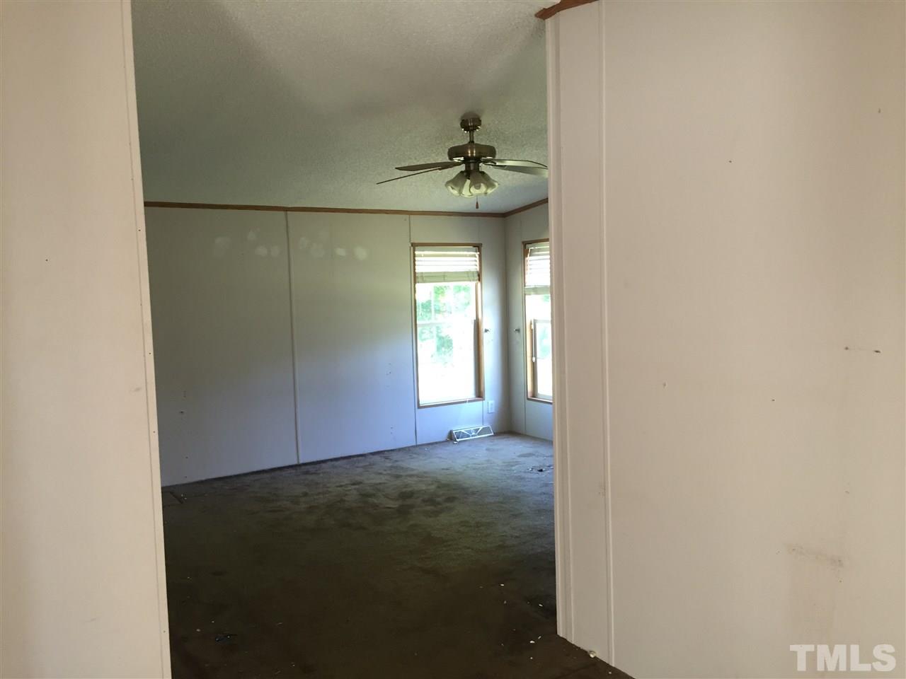 16 Trevor Kirk Road Timberlake, NC 27583 - Photo 2 of 12 a view of an empty room with a window