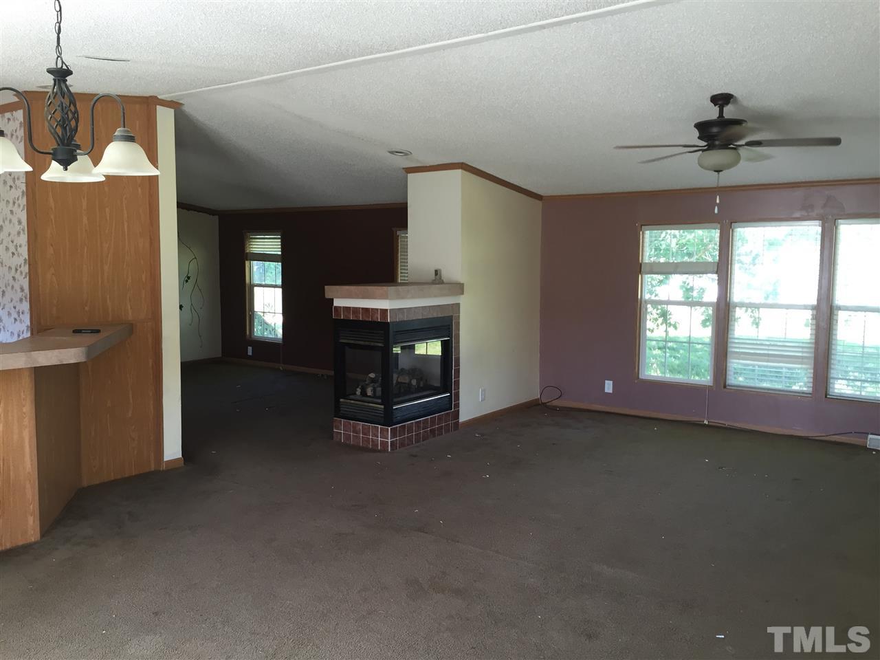 16 Trevor Kirk Road Timberlake, NC 27583 - Photo 5 of 12 a view of an empty room with a window