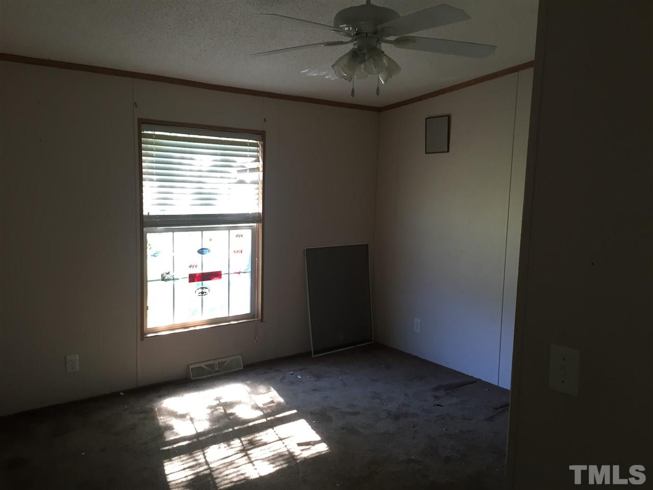 16 Trevor Kirk Road Timberlake, NC 27583 - Photo 9 of 12 a view of an empty room and window