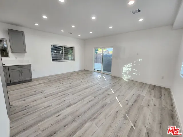 a view of livingroom and hardwood floor