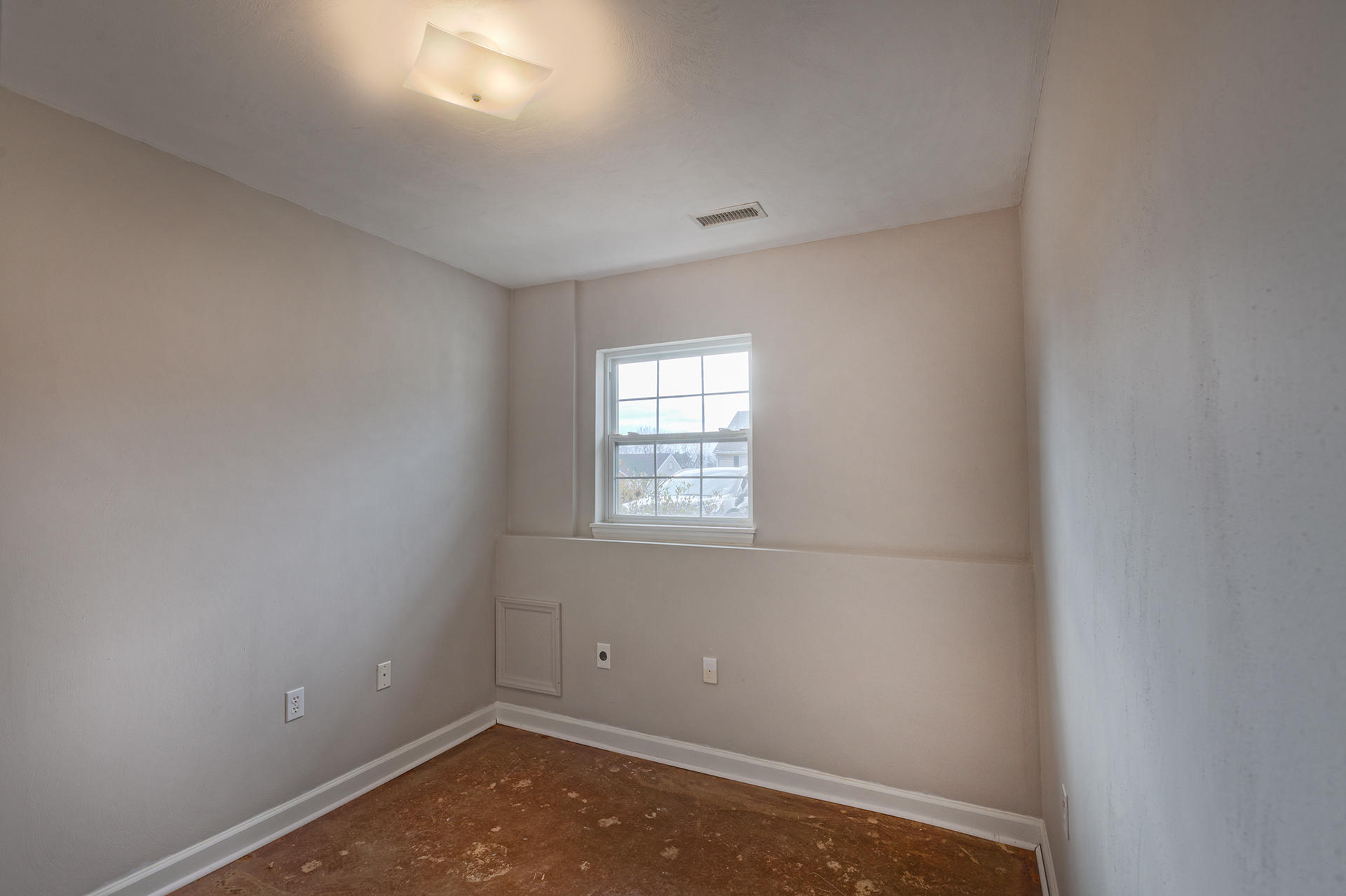 4754 West Westvale Road Northeast Roanoke, VA 24019 - Photo 16 of 22 an empty room with a window
