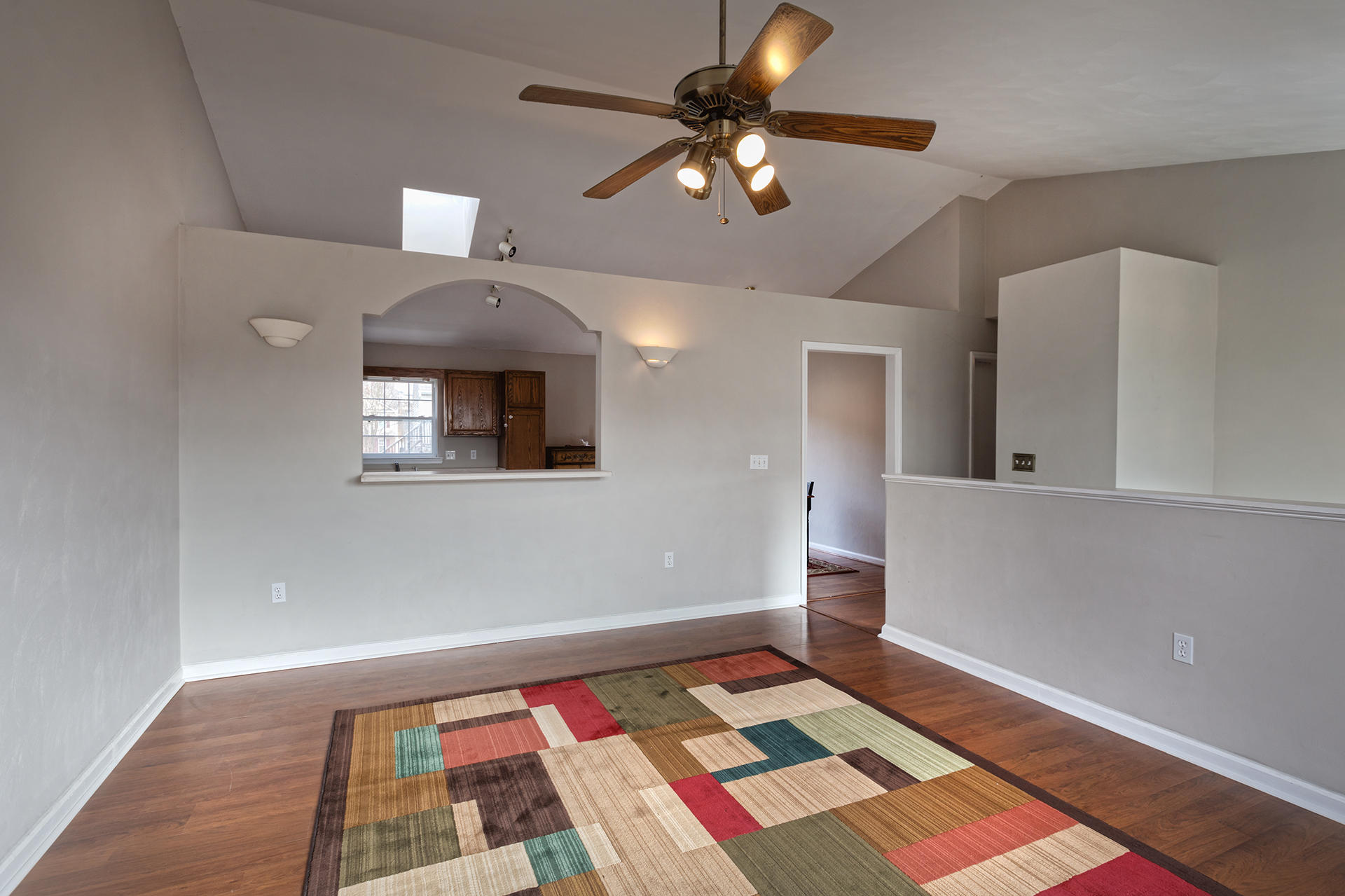 4754 West Westvale Road Northeast Roanoke, VA 24019 - Photo 3 of 22 a bedroom with a bed and a chandelier