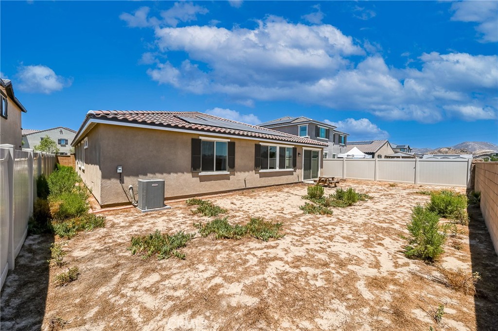 711 Ballesteros Street Perris, CA 92571 - Photo 37 of 39 Backyard and Hills view