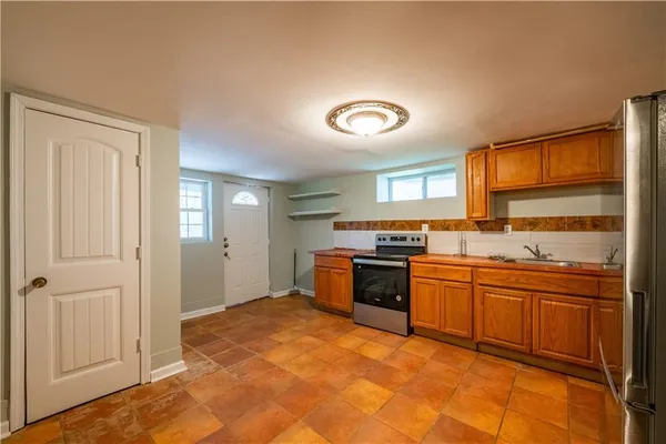a view of an empty room and window