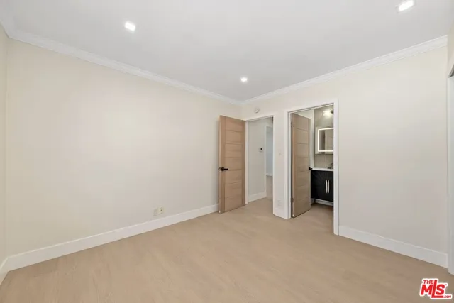 an empty room with a bathroom