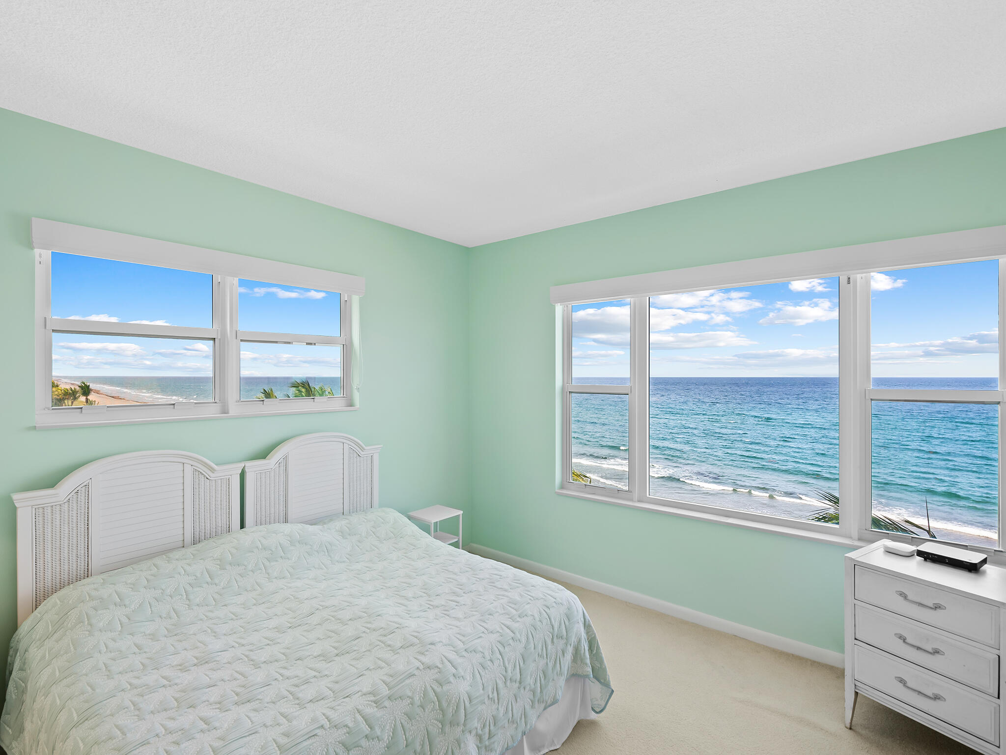2921 South Ocean Boulevard, Unit 507 Highland Beach, FL 33487 - Photo 11 of 22 a bedroom with a bed and a window