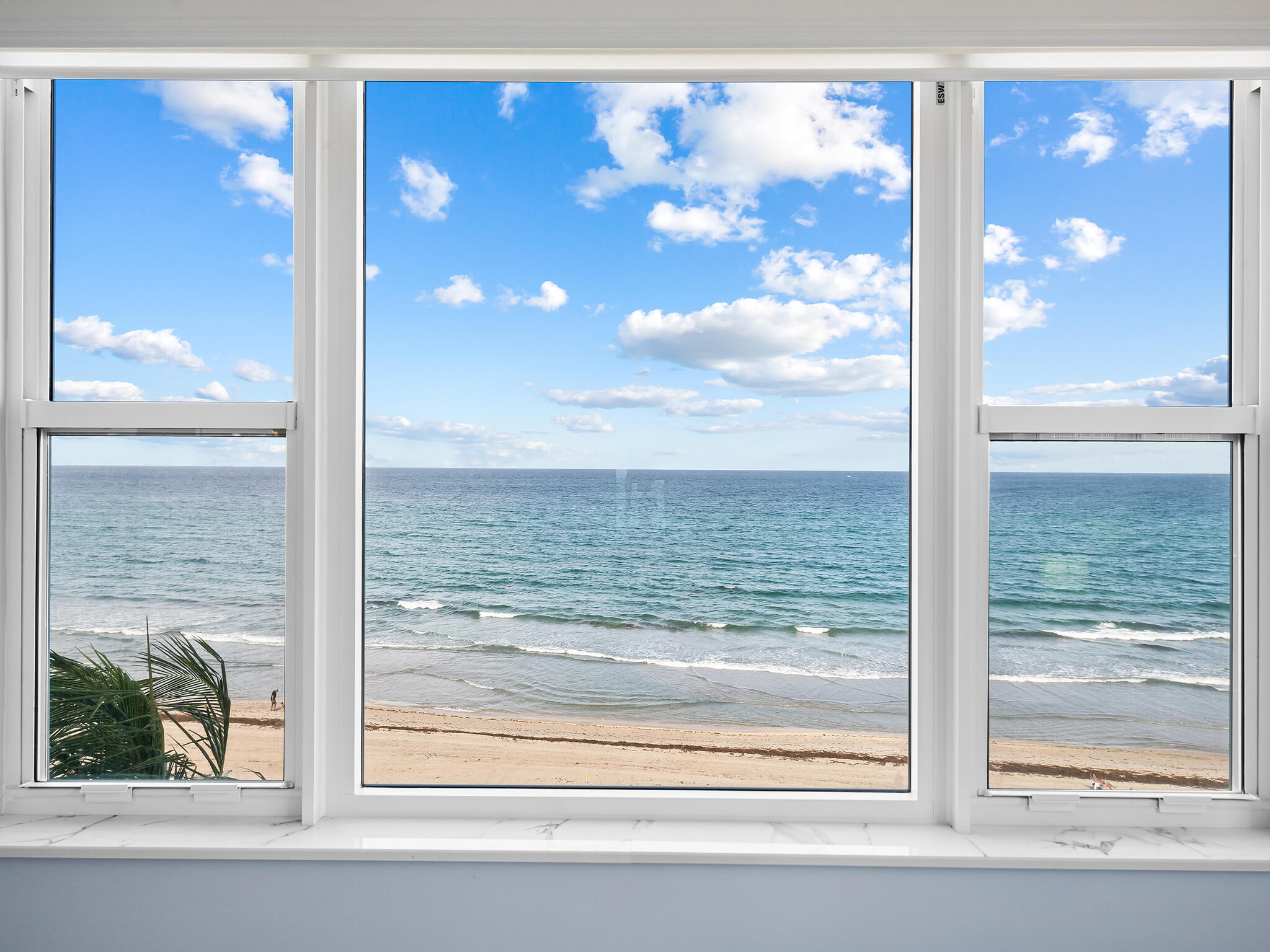2921 South Ocean Boulevard, Unit 507 Highland Beach, FL 33487 - Photo 17 of 22 a view of a glass door with a view of the background