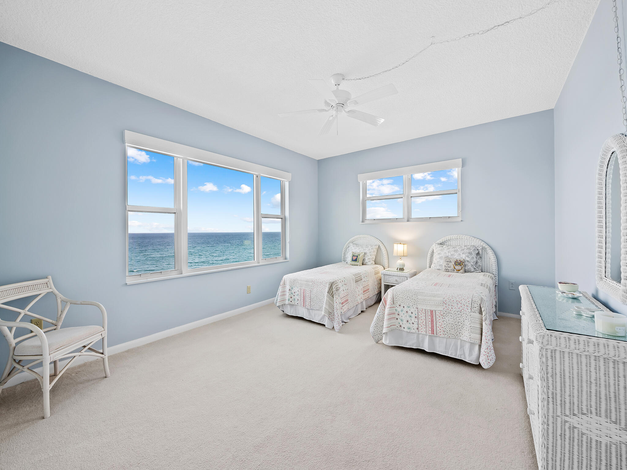 2921 South Ocean Boulevard, Unit 507 Highland Beach, FL 33487 - Photo 19 of 22 a bedroom with two beds and a window