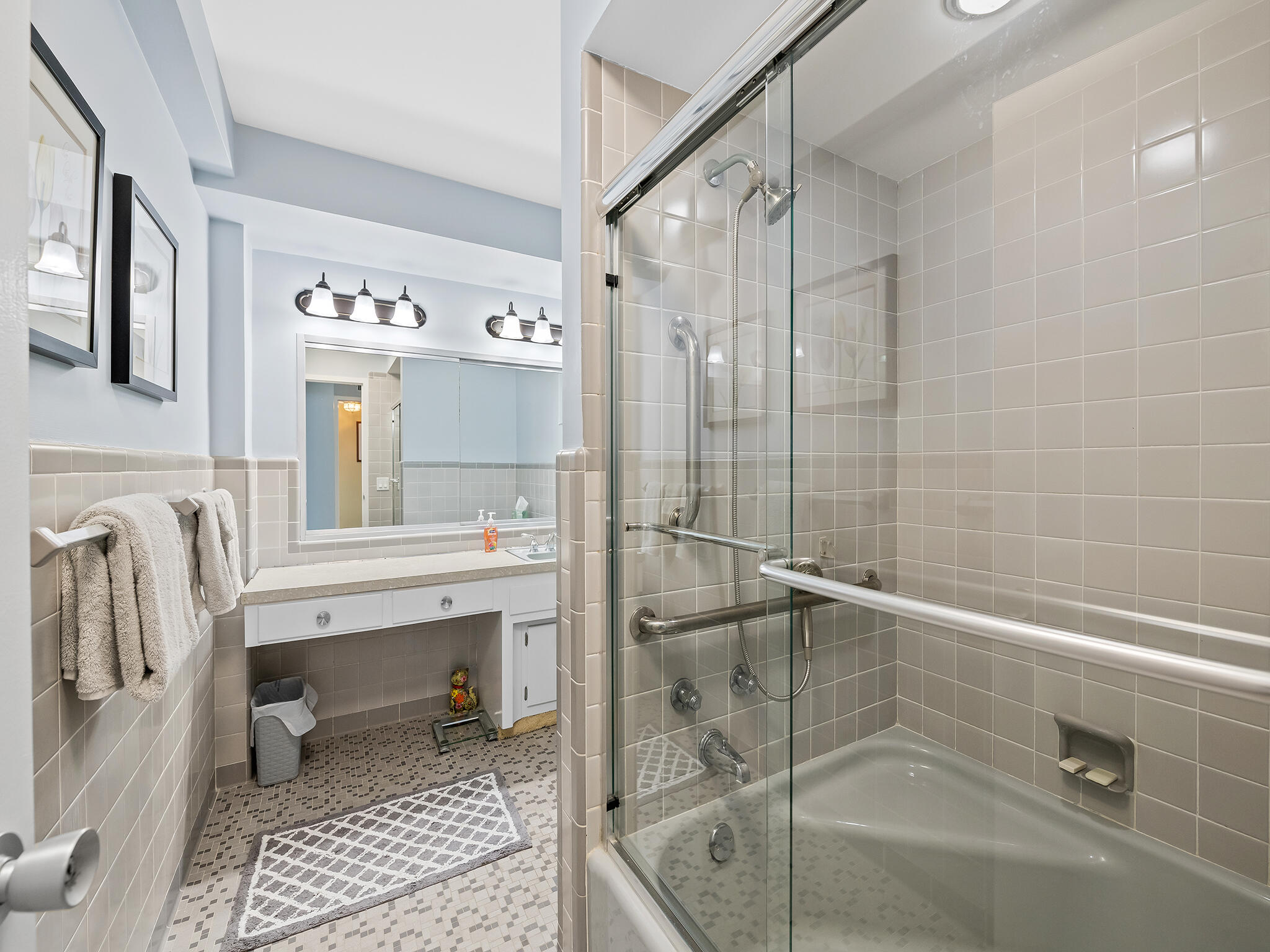 2921 South Ocean Boulevard, Unit 507 Highland Beach, FL 33487 - Photo 21 of 22 a bathroom with a sink a toilet and shower