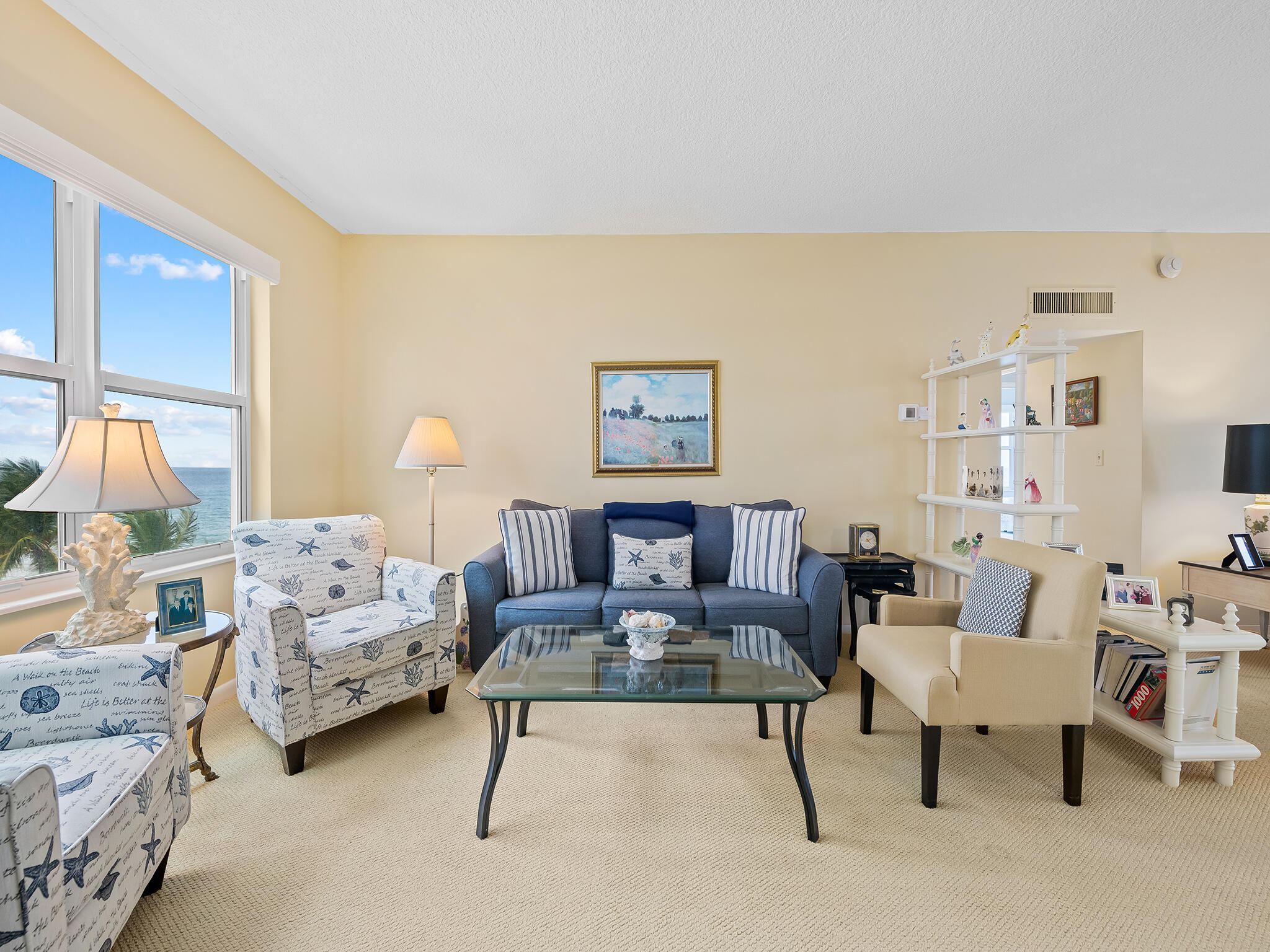 2921 South Ocean Boulevard, Unit 507 Highland Beach, FL 33487 - Photo 4 of 22 a living room with furniture and a couch