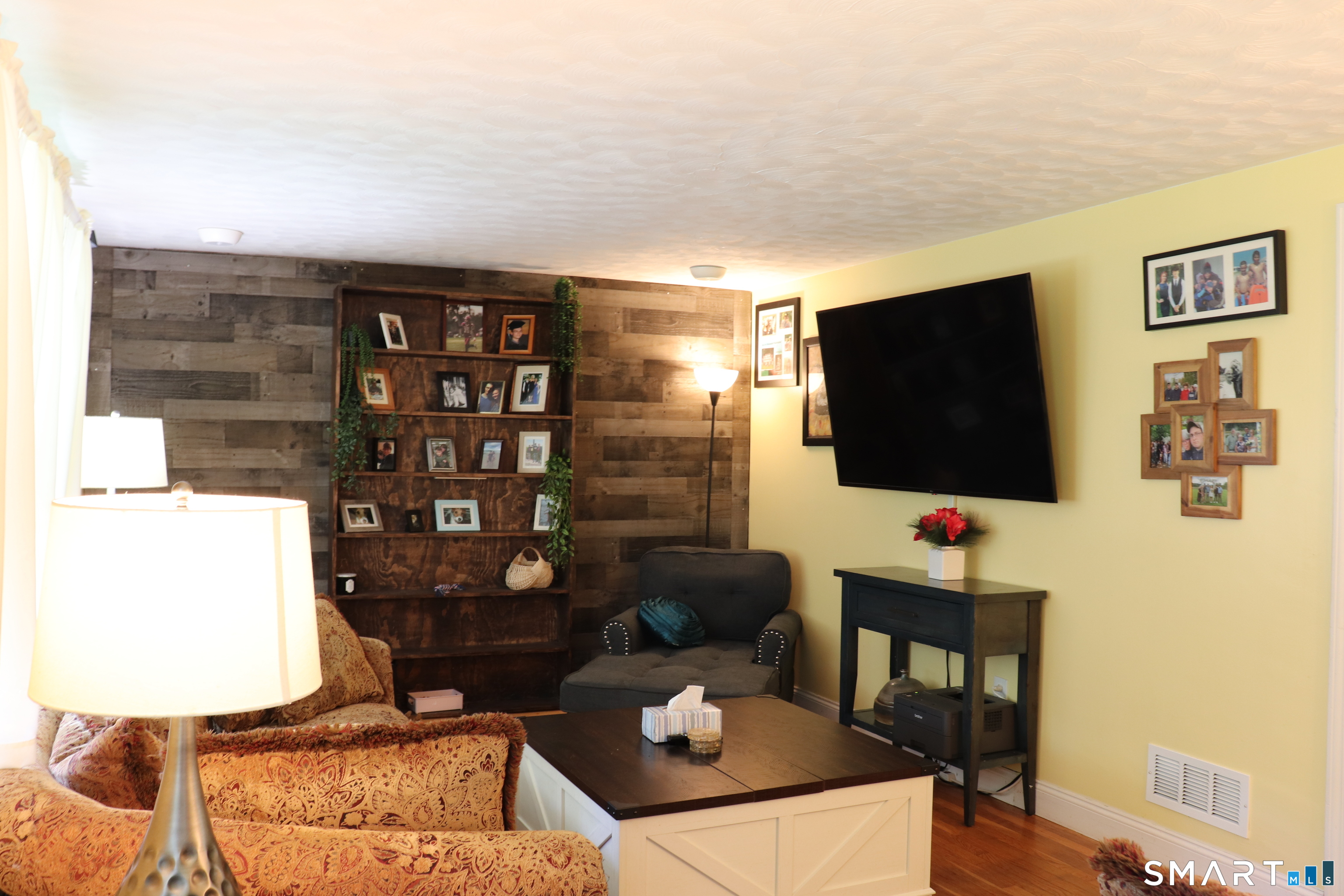 308 Abbe Road Enfield, CT 06082 - Photo 8 of 33 a living room with furniture and a flat screen tv