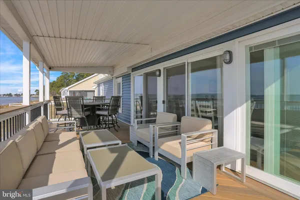 a view of balcony with chairs
