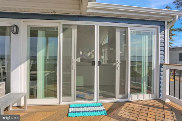 a view of a house with a window and stairs