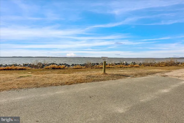 a view of swimming pool with seating space