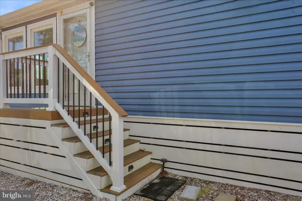 a view of a house with a street