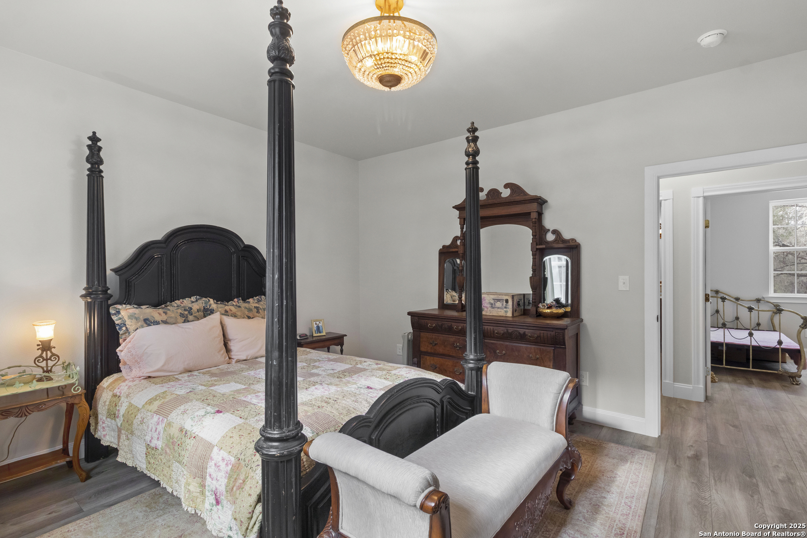 792 Alamo Beach Road Pipe Creek, TX 78063 - Photo 13 of 70 a bedroom with bed and window