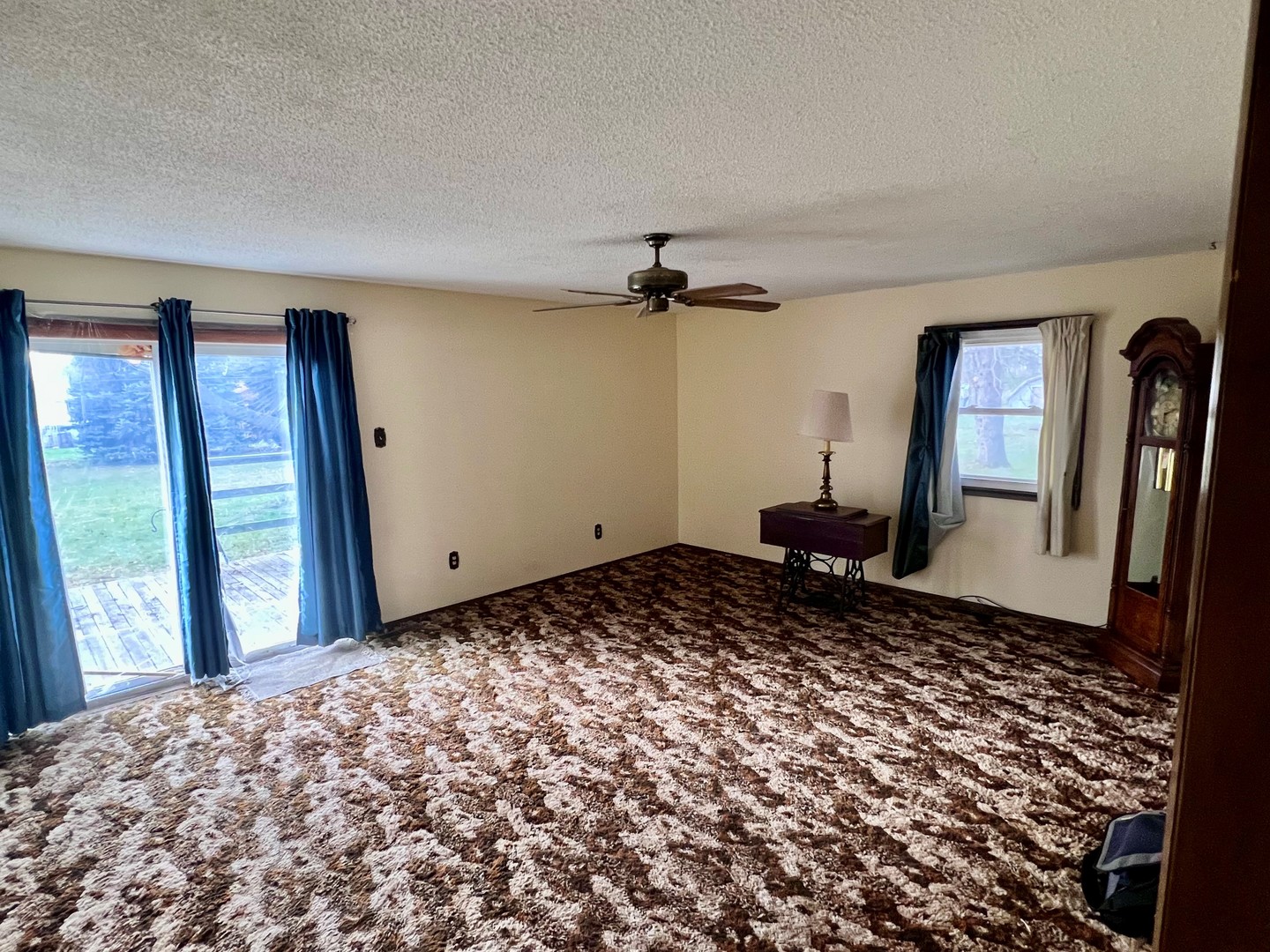 26899 Knief Road Rock Falls, IL 61071 - Photo 3 of 14 a view of a bedroom with a bed and wooden floor